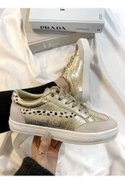 CASSIE GOLD ANIMAL PRINT TRAINERS